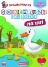 Słodkie maluszki i ich rodzice. Na wsi - zdjęcie