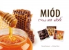 Miód na stole - zdjęcie