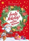 Święty Mikołaj wchodzi kominem - zdjęcie