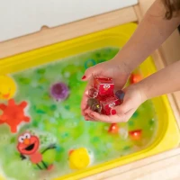 Glo Pals Kostki sensoryczne świecące w wodzie Elmo Ulica Sezamkowa, zabawka, zdjęcie 4