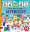 W mieście. Książeczka z okienkami. 100 okienek – 100 słów - zdjęcie