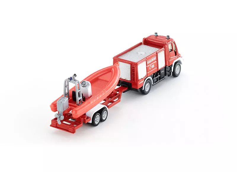 Straż pożarna Unimog z łodzią 1:87 - Zabawki