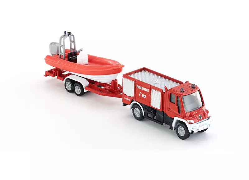 Straż pożarna Unimog z łodzią 1:87 - Zabawki