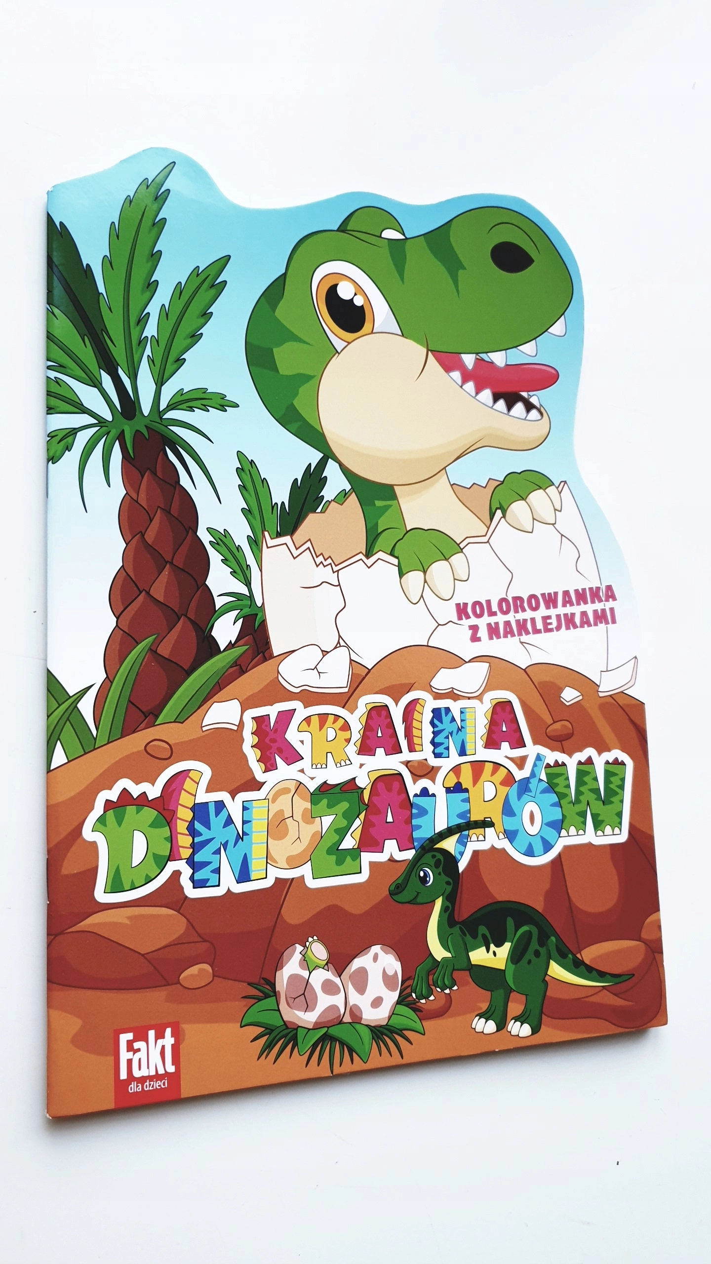 Kraina Dinozaurów - Kolorowanka z naklejkami - Książki