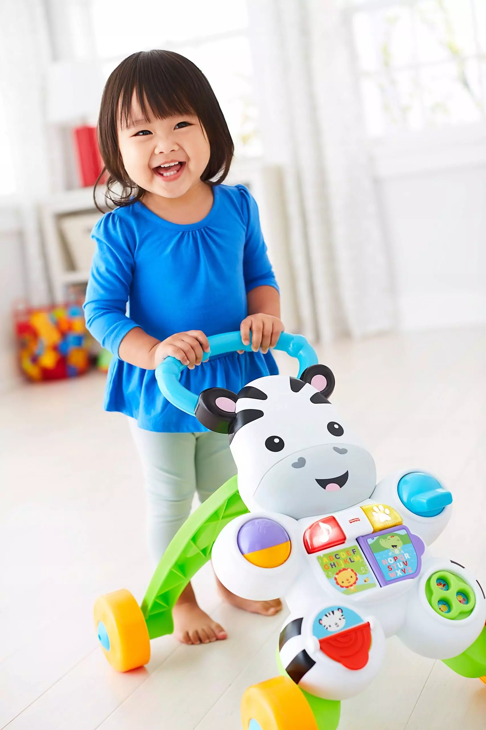 Fisher-Price. DPL53 Interaktywny chodzik Zebra - Zabawki